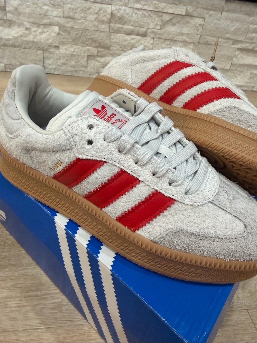 adidas Women’s Suede Sneakers - White with Red Stripes and Gum Sole